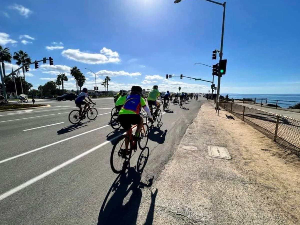 BCI riders cycling along the Carlsbad coastline