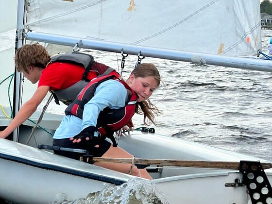 ETYSA campers preparing boats at the dock