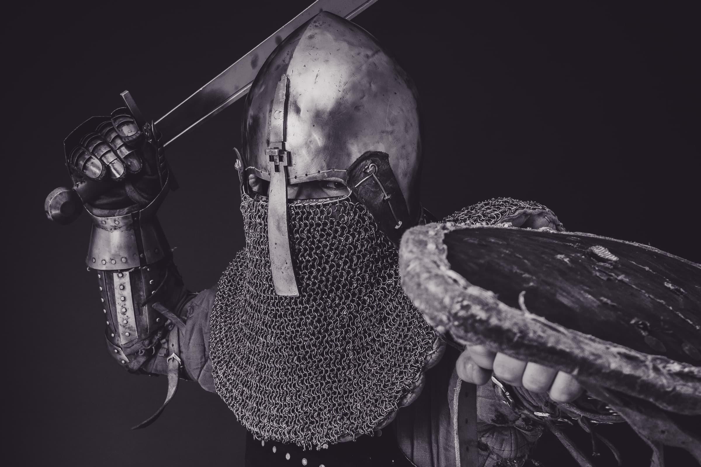 HEMA practitioner in full protective gear with sword