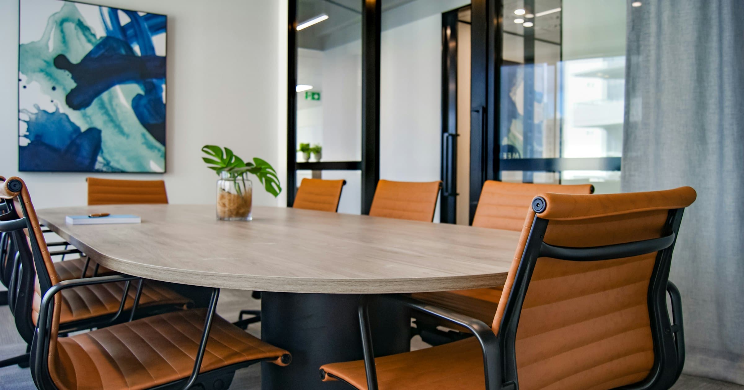 A boardroom set up for a club committee meeting